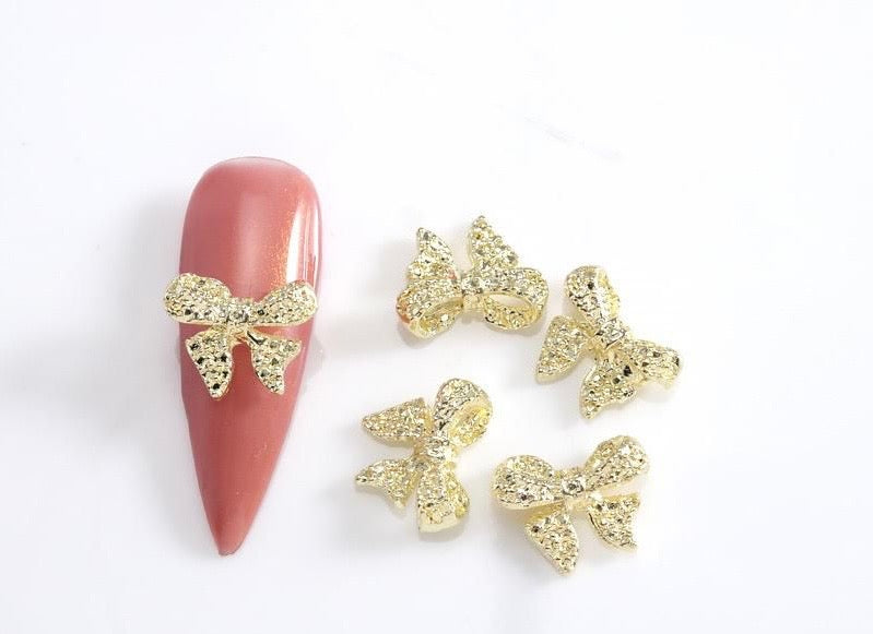 Dijes de moños 🎀