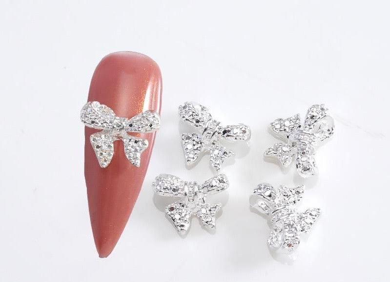 Dijes de moños 🎀