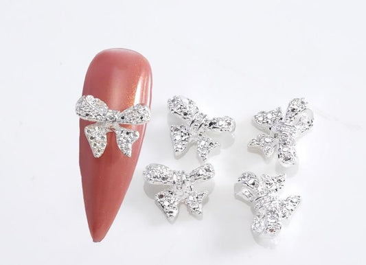 Dijes de moños 🎀