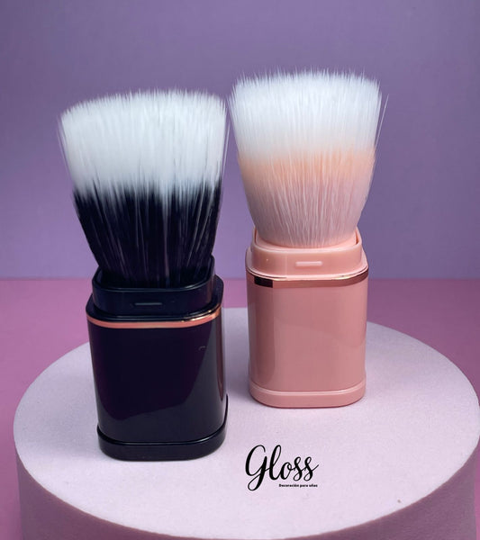 Brocha para sacudir el exceso de polvo